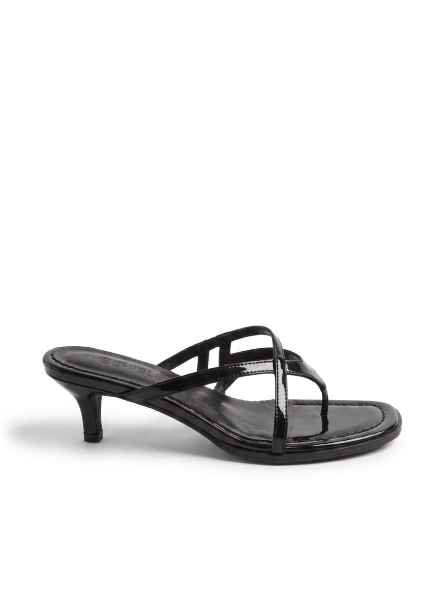 Black kitten heel sandal with crossover straps and a 4cm heel